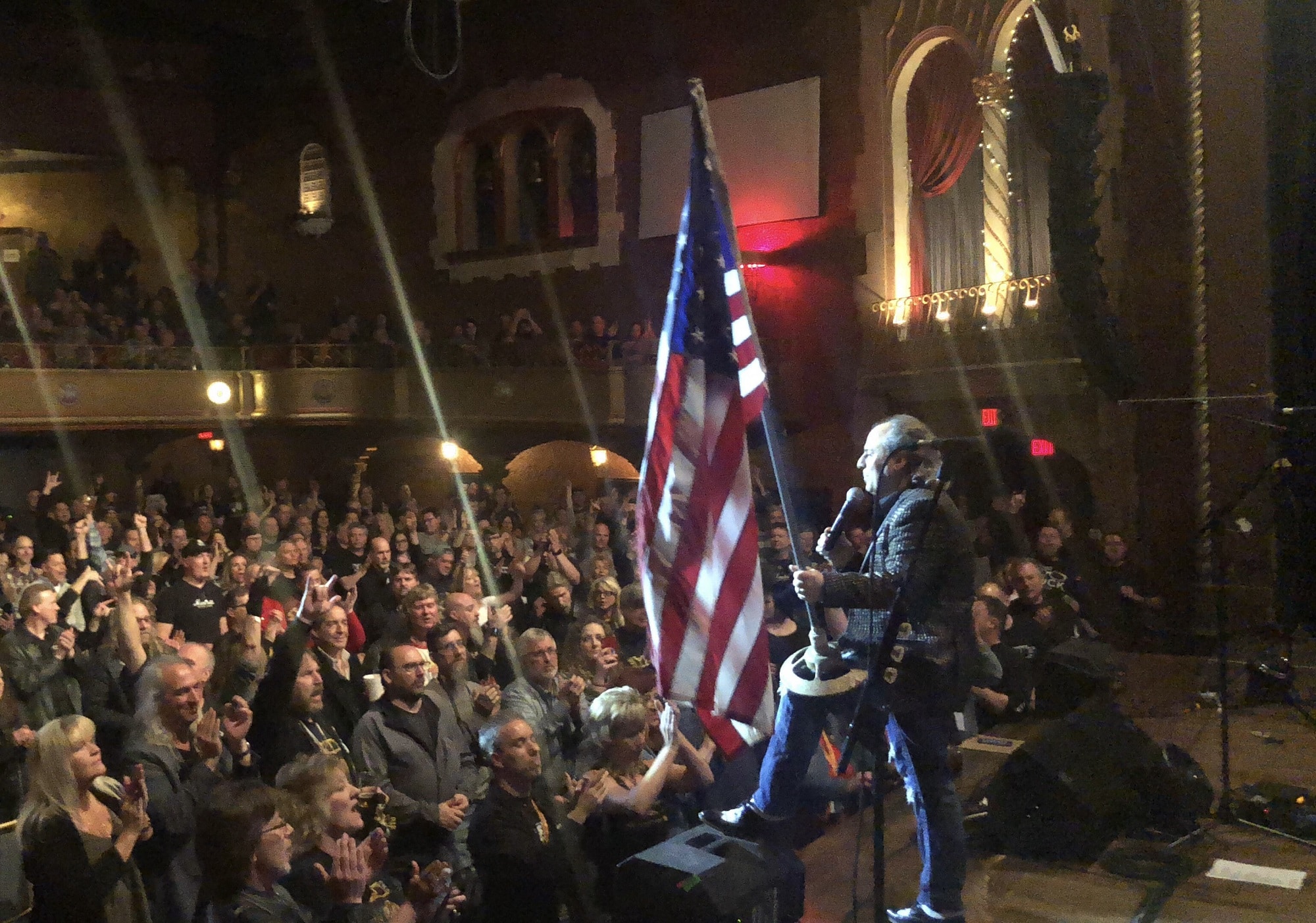 ron with american flag and crowd